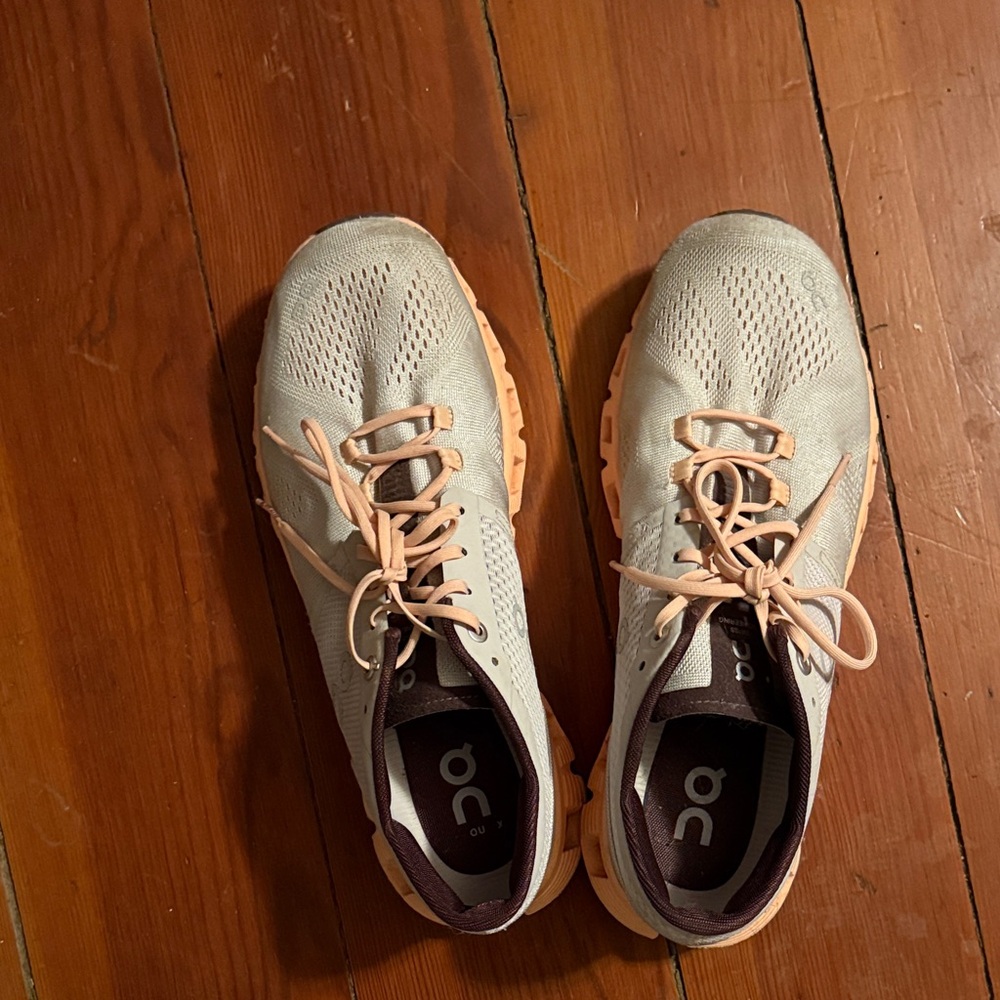 On Running Shoes with Cream and Peach Accents
